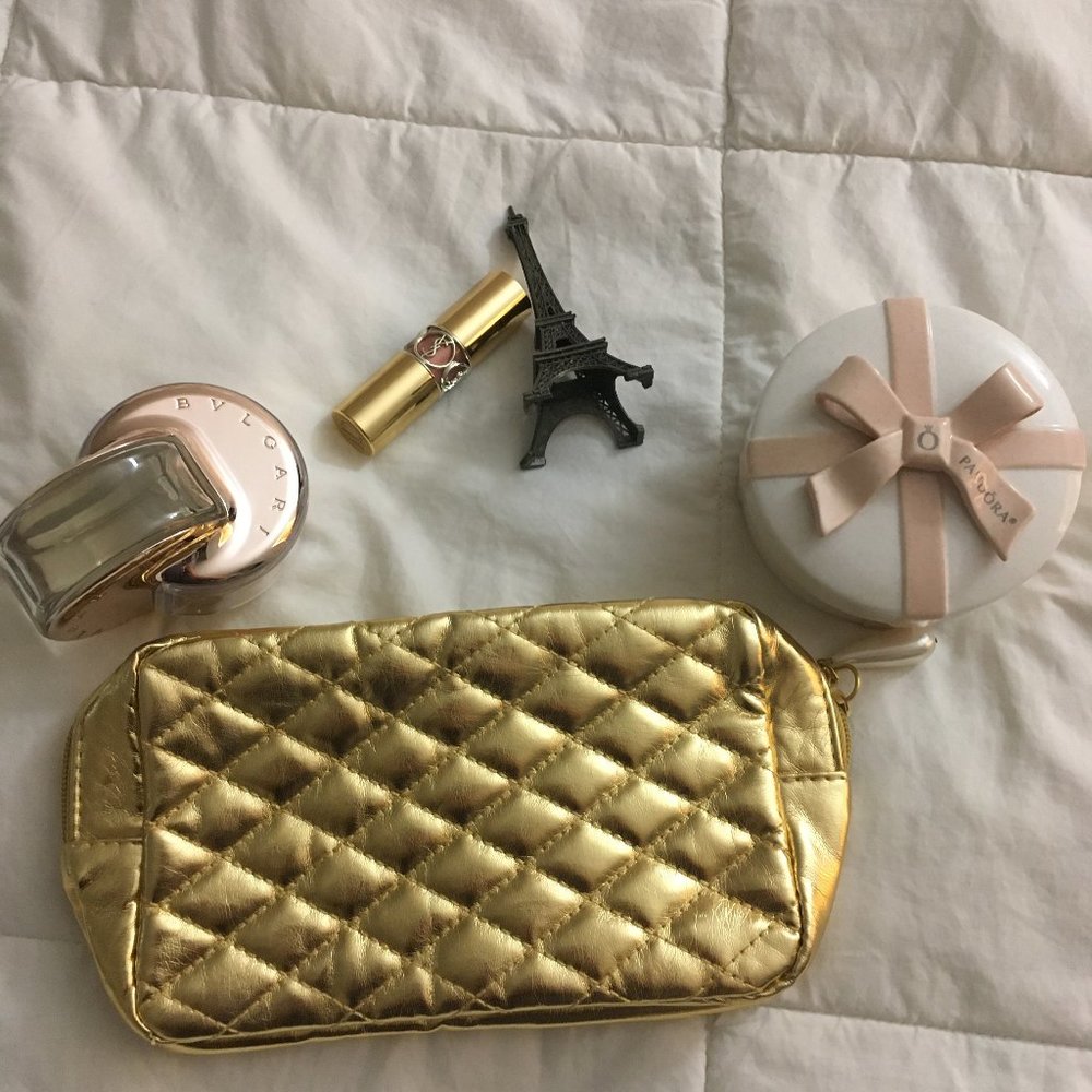 AVON gold metallic cosmetic bag